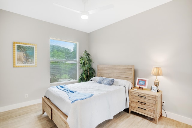 bedroom featuring light wood-type flooring and ceiling fan