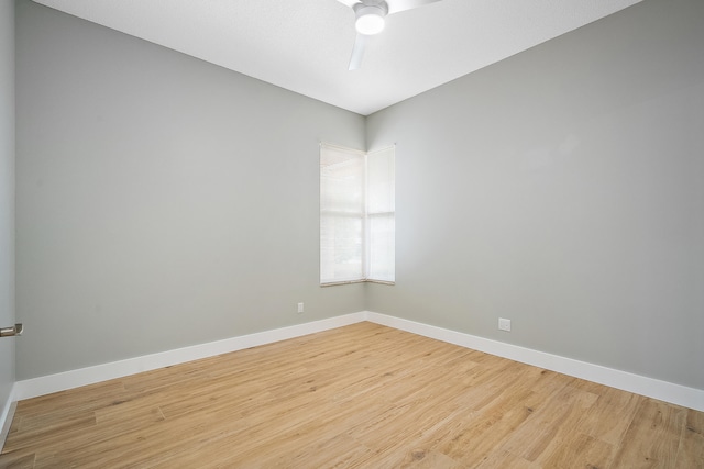 spare room with light wood-type flooring