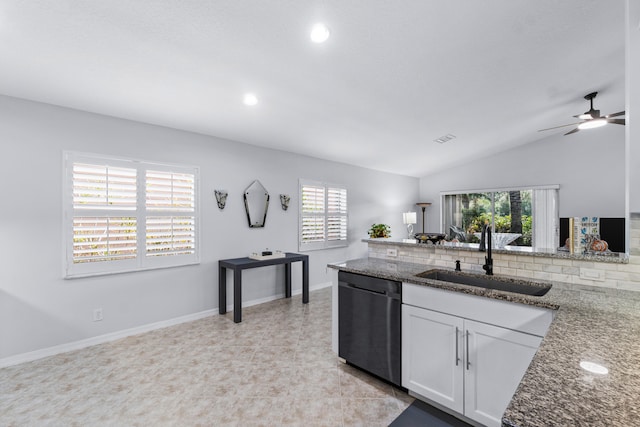 kitchen featuring dishwasher, white cabinets, a healthy amount of sunlight, and sink