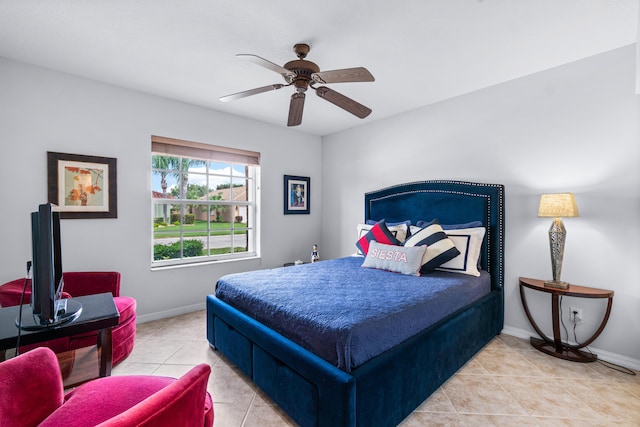 bedroom featuring light tile patterned floors and ceiling fan