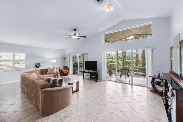 living room with high vaulted ceiling, ceiling fan, and light tile patterned flooring