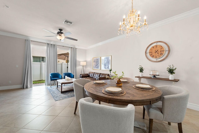 tiled dining room with ceiling fan and crown molding