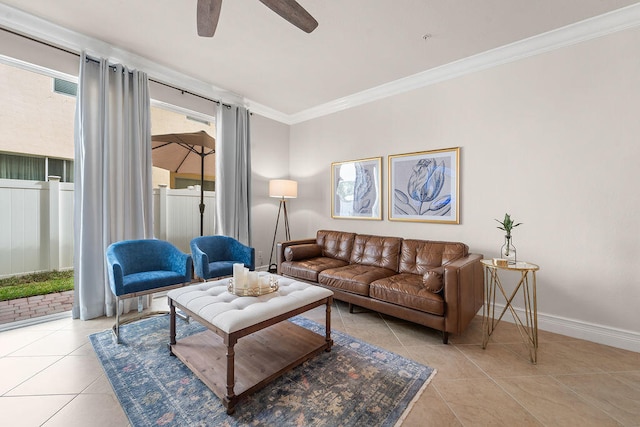 living room featuring ceiling fan, light tile patterned floors, and ornamental molding