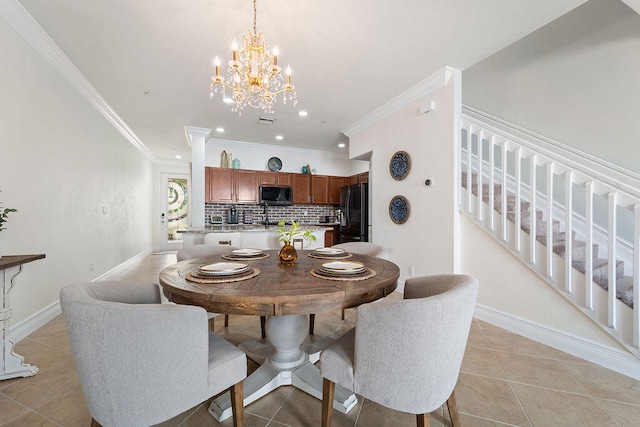 dining area with an inviting chandelier, light tile patterned floors, crown molding, and sink