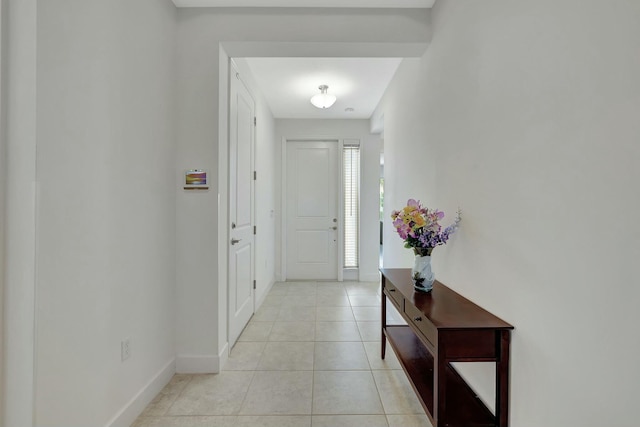 entryway featuring light tile patterned floors