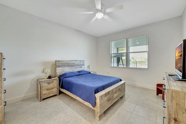 bedroom featuring ceiling fan and light tile patterned flooring