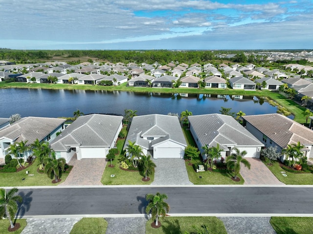 drone / aerial view with a water view