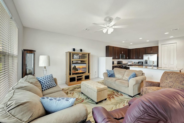 living room with ceiling fan