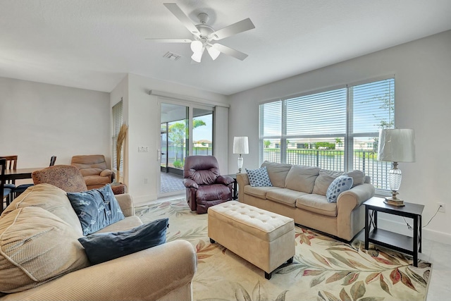 living room featuring ceiling fan