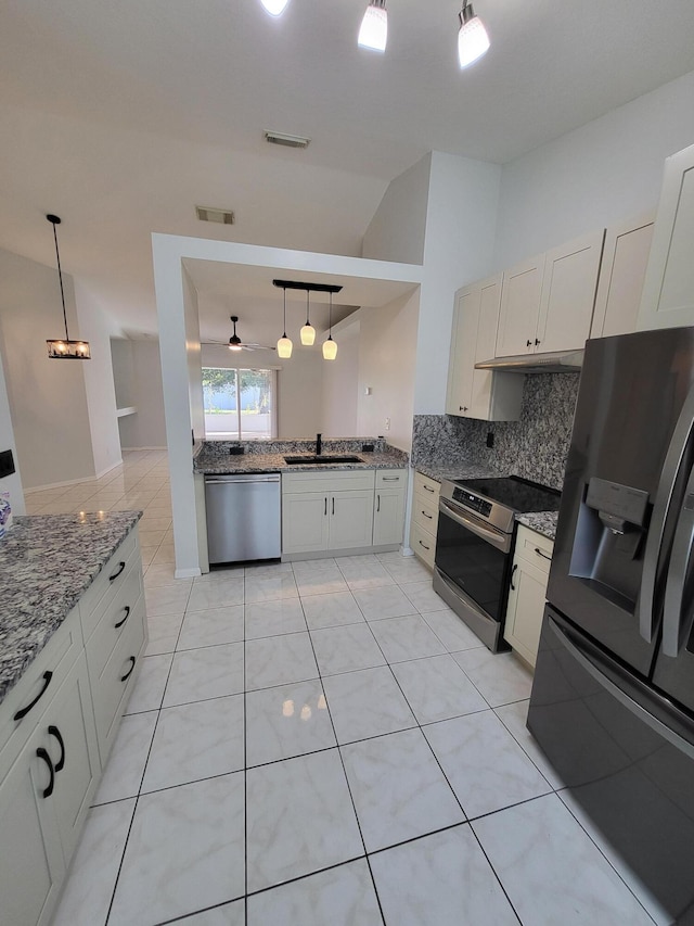 kitchen with sink, ceiling fan, appliances with stainless steel finishes, decorative light fixtures, and white cabinetry