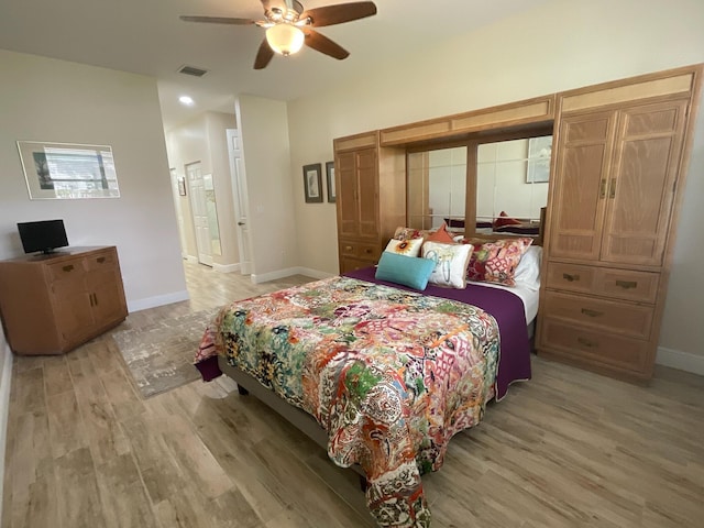 bedroom featuring ceiling fan and light wood-type flooring