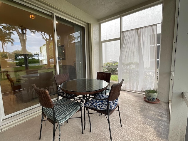 sunroom / solarium featuring plenty of natural light