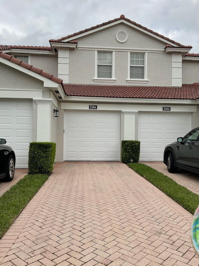 view of front of property with a garage