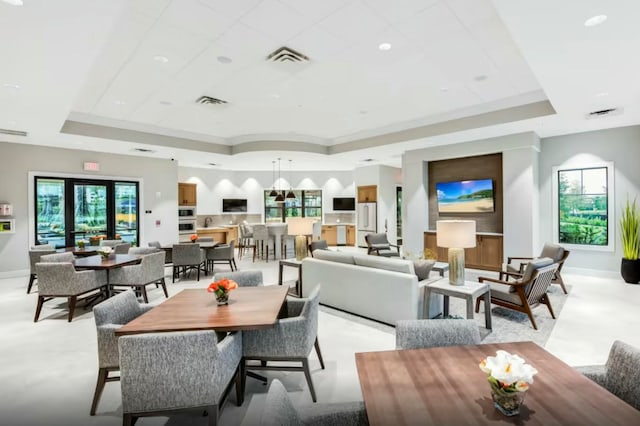 dining room featuring a tray ceiling