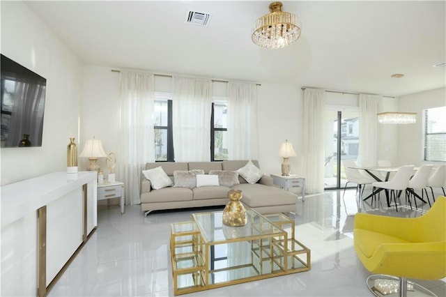 living room featuring a chandelier