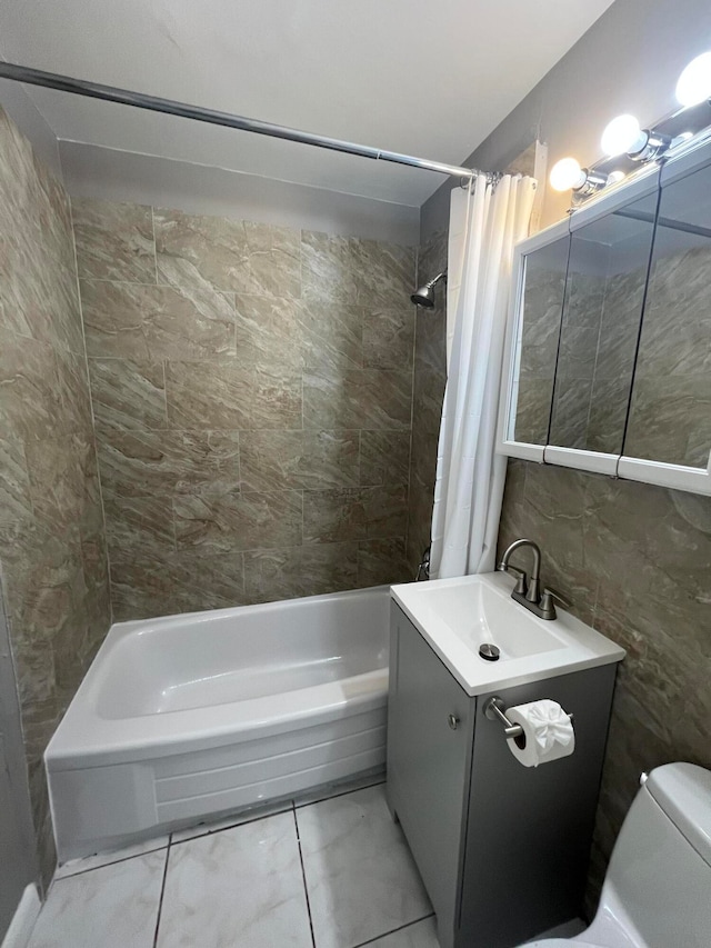 full bathroom featuring vanity, shower / bathtub combination with curtain, tile walls, and toilet