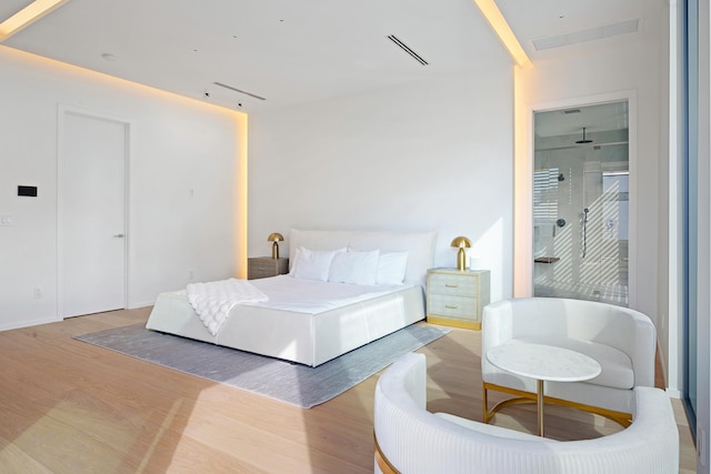 bedroom featuring light wood-type flooring