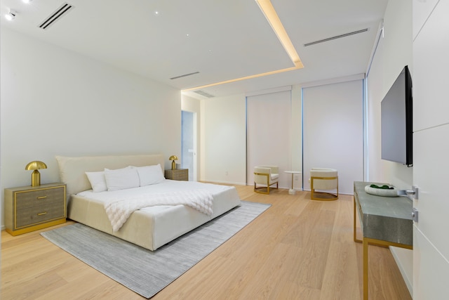 bedroom featuring light hardwood / wood-style floors