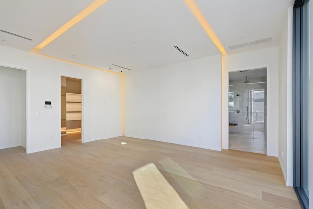 unfurnished room featuring light hardwood / wood-style flooring