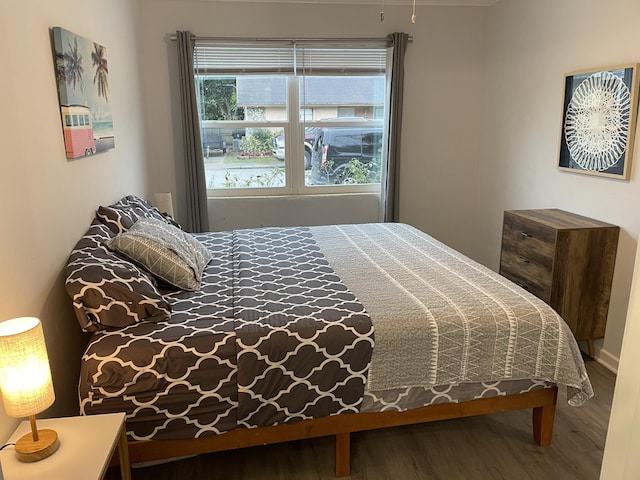 bedroom featuring hardwood / wood-style floors