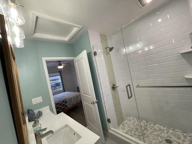 bathroom featuring sink and an enclosed shower