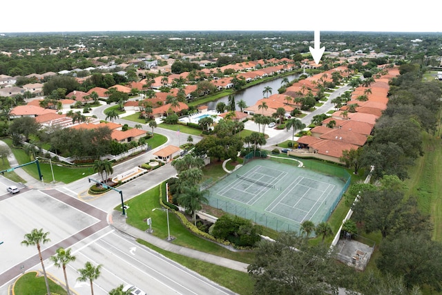 2843 SW Mariposa Cir, Palm City, FL 34990 - aerial overview of property's location with nearby suburban area and a large body of water
