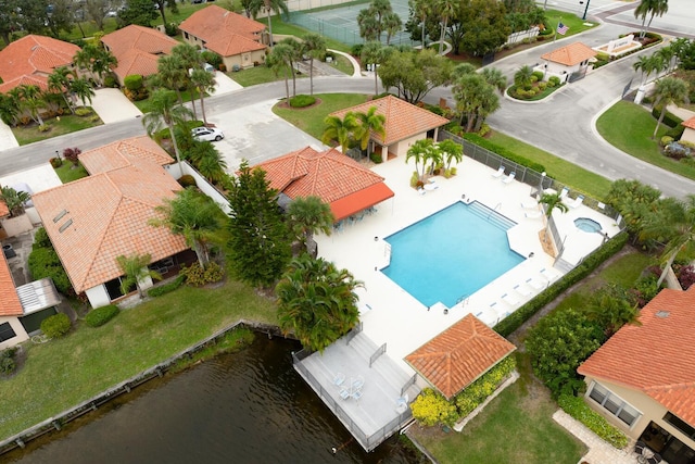 2843 SW Mariposa Cir, Palm City, FL 34990 - bird's eye view of a pool area and a nearby body of water