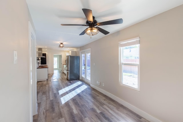 interior space featuring ceiling fan and light hardwood / wood-style floors