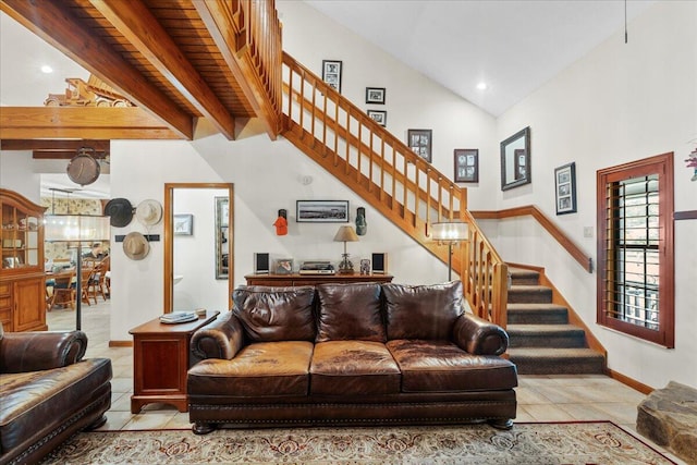 tiled living room featuring beamed ceiling, wooden ceiling, and high vaulted ceiling