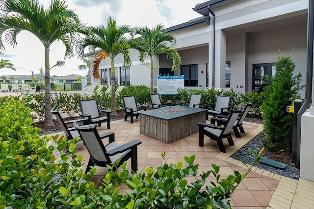 view of patio featuring a fire pit