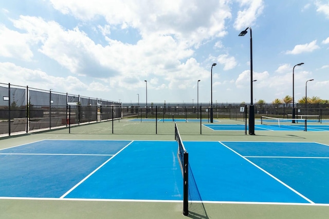 view of tennis court with basketball court