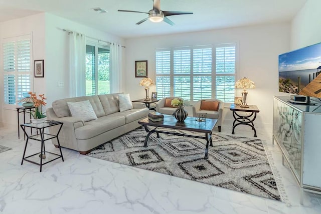 living room featuring ceiling fan