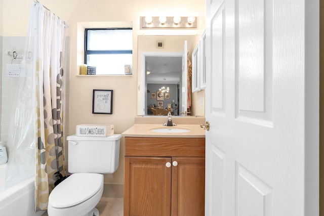 full bathroom featuring tile patterned floors, vanity, toilet, and shower / bathtub combination with curtain