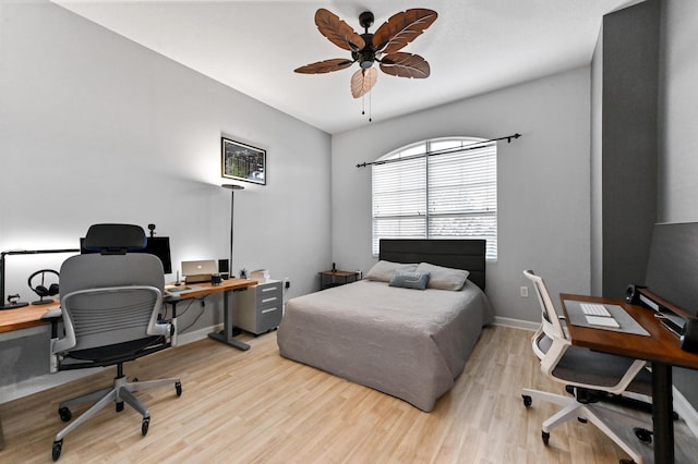 bedroom featuring ceiling fan and light hardwood / wood-style floors