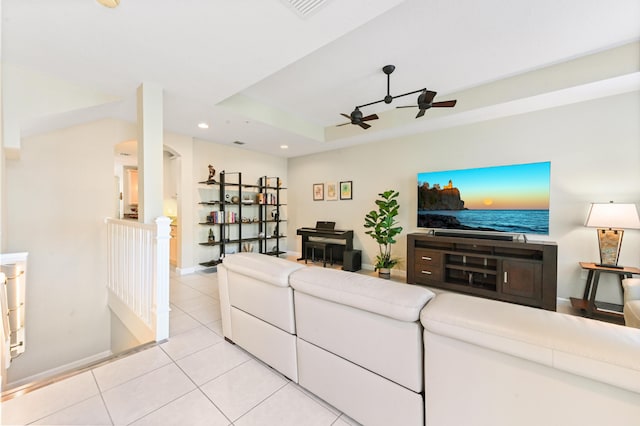 tiled living room featuring ceiling fan