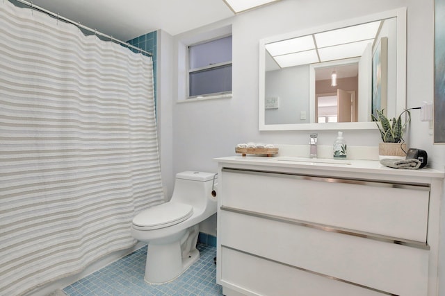 1000 NE 12th Ave Unit 304, Hallandale Beach, FL 33009 - bathroom with toilet, vanity, and tile patterned flooring