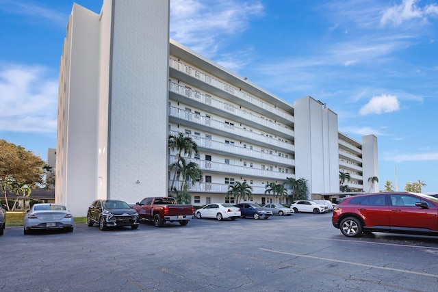1000 NE 12th Ave Unit 304, Hallandale Beach, FL 33009 - view of apartment building / complex with uncovered parking