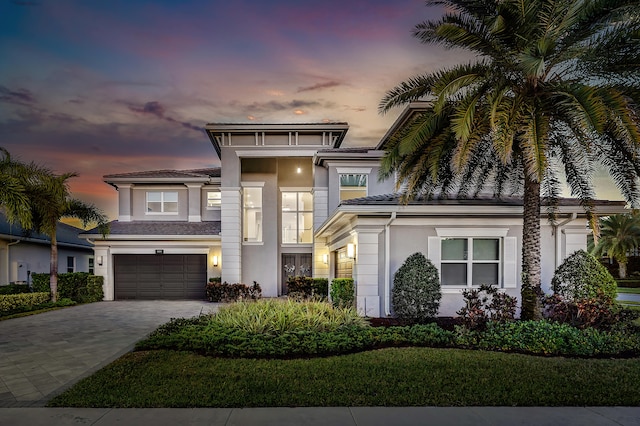 view of front of property with a garage