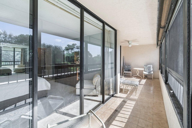 balcony featuring ceiling fan