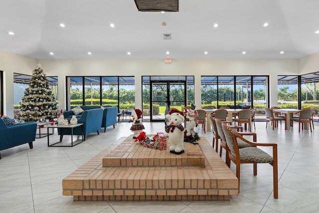 dining room with vaulted ceiling, plenty of natural light, and ceiling fan