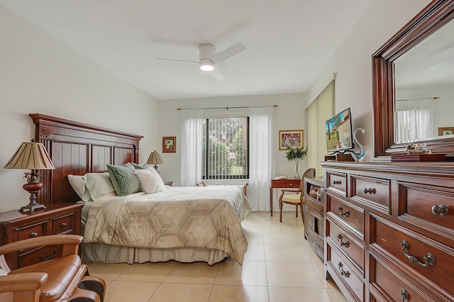 tiled bedroom with ceiling fan