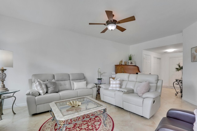 living room with ceiling fan and light tile patterned floors