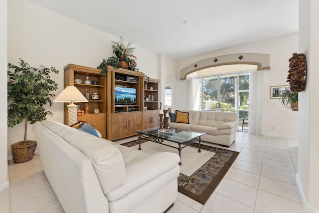 living room featuring light tile patterned flooring