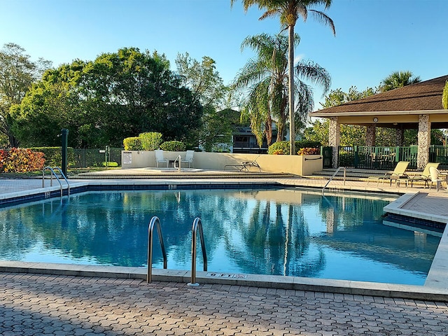 view of swimming pool featuring a patio