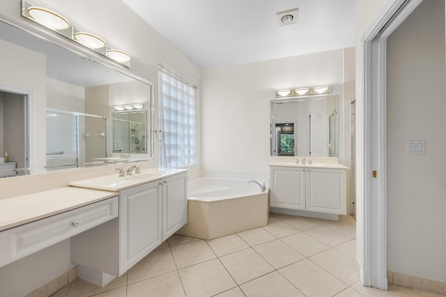 bathroom featuring vanity, tile patterned floors, and independent shower and bath