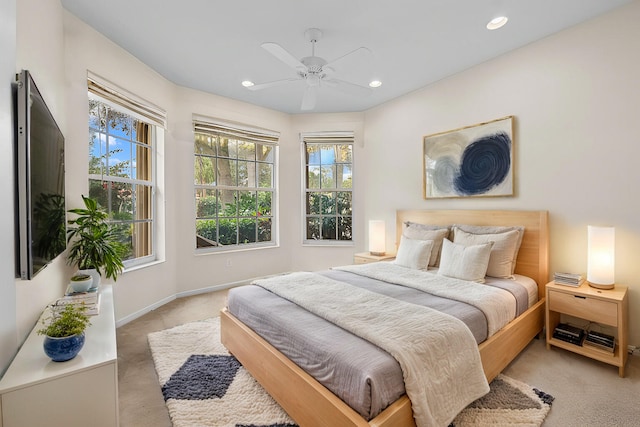 carpeted bedroom featuring ceiling fan