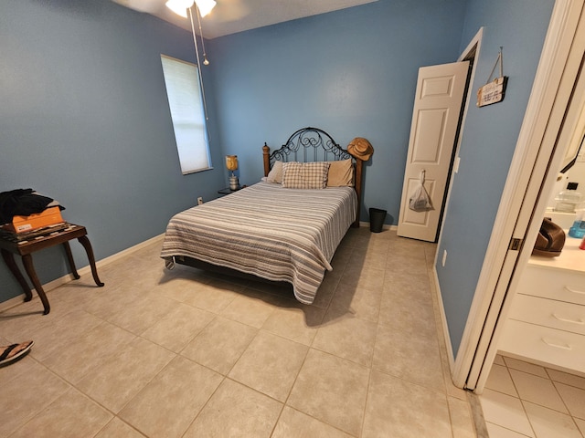 bedroom featuring light tile patterned floors