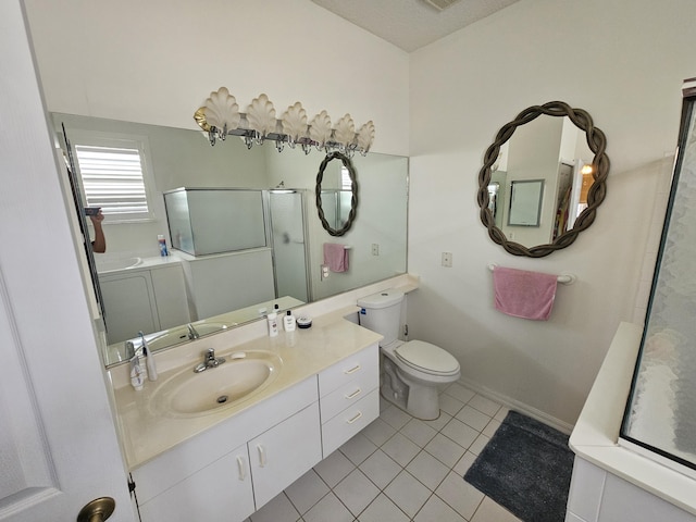 bathroom with toilet, tile patterned flooring, vanity, and a shower with shower door