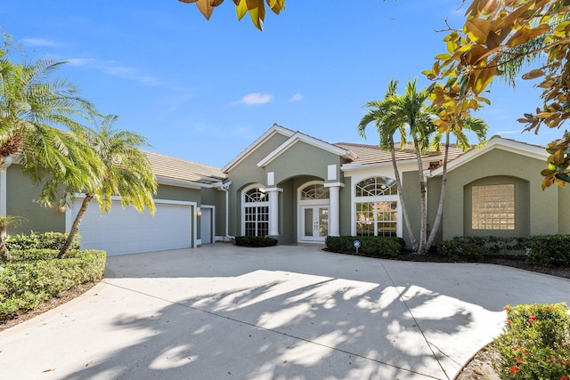 single story home featuring a garage