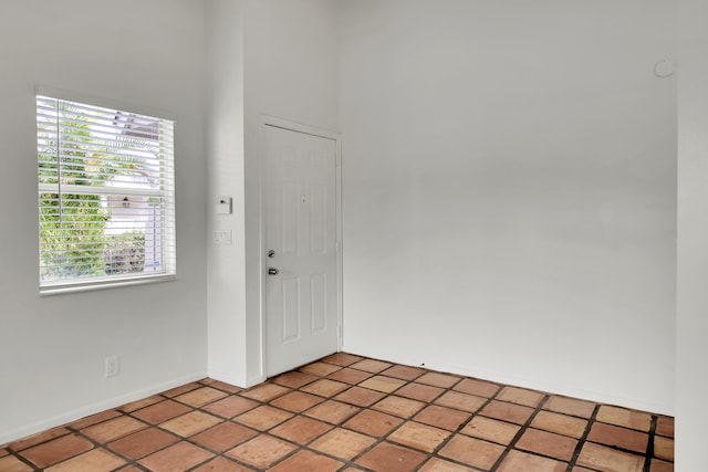 foyer entrance featuring tile patterned flooring